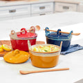 Stoneware Casserole Dish with Wooden Spoon