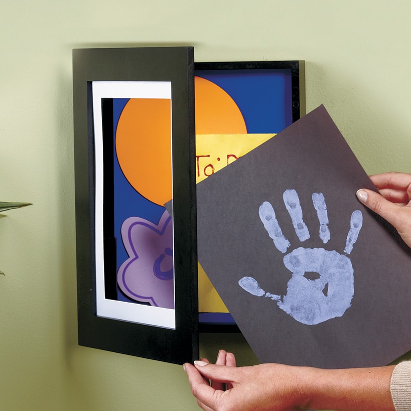 Interchangeable Artwork Frame With Storage