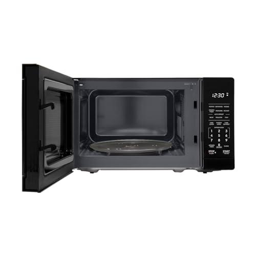 Compact Oven with Removable 10" Carousel Turntable, 700 Watt Countertop Microwave, White Q998