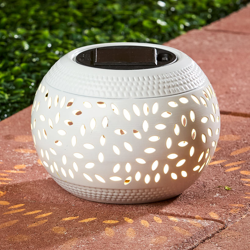Solar Cutout Shadow Cast Round Table Lanterns